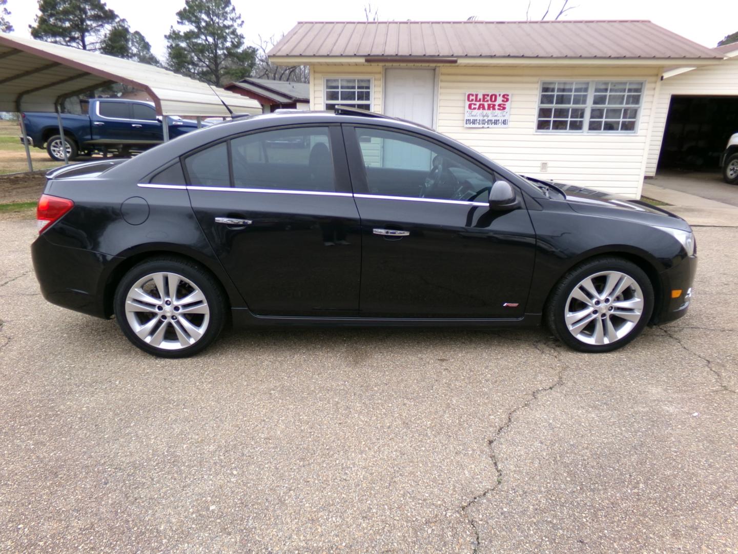 2013 Carbon Flash Metallic /Black Chevrolet Cruze LTZ (1G1PG5SBXD7) with an 1.4L Turbo engine, automatic transmission, located at 401 First NE, Bearden, AR, 71720, (870) 687-3414, 33.726528, -92.611519 - Photo#23